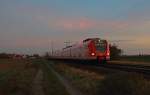 423 741-6 und ein weiterer 423 haben am Abend des 31.10.2014 als S 11 den Bahnhof Nievenheim in Richtung Düsseldorf Flughafen verlassen