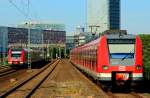 422 640-0 und 423 540 sind am 01.07.2015 bei Düsseldorf-Hamm in Richtung Düsseldorf Hauptbahnhof unterwegs, die unterschiedliche Frontgestaltung der beiden Baureihen ist hier gut erkennbar