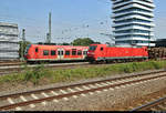 Während ein gemischter Gz mit 185 383-7 DB im Bahnhof Bietigheim-Bissingen auf Gleis 4 steht, verlassen 425 804-2 und 425 ??? von DB Regio Baden-Württemberg, im Dienste von Abellio Rail