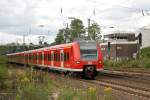 RB42 bestehend aus 425 521-2 (vorne) und 425 025-4 kurz vor der Einfahrt in den Hauptbahnhof Recklinghausen.