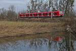 425 801 als RB 93 / 177712, Lindau Insel - Friedrichshafen Stadt, weiter als IRE 4806, Friedrichshafen - Ulm, am 20.12.2021 bei Eriskirch