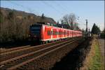 425 597/097 und 425 572/072 fahren am Mittag des 09.02.2008 als RE8 (RE 11320)  Rhein-Erft-Express  bei Leutesdorf nach Mnchengladbach Hbf.