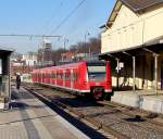 425 058/558 bei der Ausfahrt von Herzogenrath als 11072 an einem sonnigen Wochentag im Februar