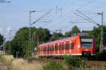 Ein 425er als RB33 nach Duisburg, ebenfalls am km 29.0...hab den busch da vorne en bissl gekrzt ;-)..der hat gestrt...nchster halt lindern