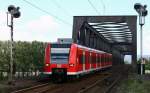 Am 04.08.08 verkehrte 425 111 als RB 18729 von Biblis nach Worms. Die Aufnahme entstand in Worms Brcke.