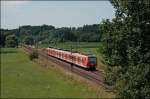 426 536/036 und ein 425er sind als RB 30064 von Traunstein nach Rosenheim unterwegs. (11.07.2008)
