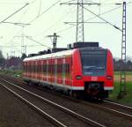 425 068/568 ist hier als RB33(11071) kurz vor der Einfahrt von Herrath am 15.03.09