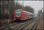 425 075 als RB33 nach Aachen Hbf in Geilenkirchen rein fahrend.