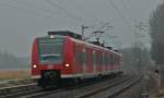 425 077 als RB11073 aus Duisburg nach Aachen am B kurz hinter bach-Palenberg 8.2.10