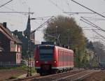 425 072-6 als RB11061 nach Aachen am Km 29.0 bei Sggerath 18.4.10