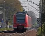 425 079-1 als RB11060 nach Duisburg am Km 29.0 zwischen Geilenkirchen und Lindern 18.4.10