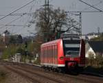 425 577-4 als RB11063 nach Aachen am Km 28.8 kurz vor Geilenkirchen, 18.4.10