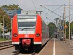 425 575-8 als RB11070 aus Aachen nach Duisburg bei der Einfahrt in Geilenkirchen, 16.5.10