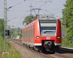 425 069 als RB11060 aus Aachen nach Duisburg am Km 28.8, 22.5.10