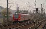 Aus der Verbindungskurve vom Berliner Hauptbahnhof kommt 425 512-1/425 012-2 whrend der Streckenerkundungsfahrt fr den zuknftigen IRE (gesehen Berlin-Wedding 20.11.2010)