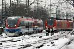 425 541-0 als RE6 nach Dsseldorf bei der gemeinsamen Einfahrt mit einem VT der Prignitzer Eisenbahn in Dortmund 19.12.2010