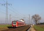 425 072-6 als RB10379 nach Aachen Hbf kurz vor dem Halt in Herrath, 29.1.11