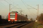 RB 10385 mit 425 074/574 nach Aachen Hbf in Erkelenz Mennekrath am 09.02.11