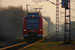 425 578-2 als RB10384 nach uuisburg (laut FIS) bei der Einfahrt in Herrath, 3.3.11