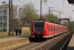 DB 425 118-7 als RB 38747 von Mannheim-Friedrichsfeld nach Mainz Hbf, am 29.03.2011 in Mainz Römisches Theater.