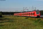 425 269-8 und ein weiterer 425 verkehrten am 01.09.2011 als RB 38865 (Mannheim-Karlsruhe) . Hier legen sie sich am Waghuseler Bogen kurz vor Waghusel in die Kurve.