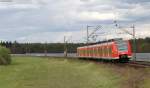 425 216-9 als RE 38857 (Ludwigshafen(Rh)Hbf-Karlsruhe Hbf) bei Waghusel 19.4.12