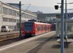 425 110-4 bei der Ausfahrt aus Heidelberg Hbf, er ist als RE2 nach Mannheim unterweg an diesem Sonntagmittag den 3.3.2013