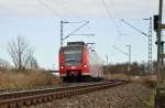 Durch die Steigung von Noithausen hoch kommend ist der 425 096-5 als RE 8 gen Mönchengladbach fahren hier bei Gubberath.