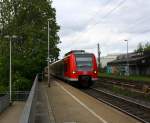 Die Rhein Niers Bahn (RB33) kommt die Kohlscheider-Rampe hoch und fährt durch Kohlscheid aus Duisburg-Hbf-Heinsberg-Rheinland) und fährt in Richtung Richterich,Laurensberg,Aachen-West bei