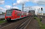 Einfahrt am 24.05.2014 von 425 721-8 zusammen mit 425 727-5 (425 225-0) als S2 nach Kaiserslautern in Ludwigshafen (Rhein) Mitte.