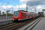 Einfahrt am 24.05.2014 von 425 215-1  Osterburken  und 425 712-7  Kaiserslautern  als S2 in Ludwigshafen (Rhein) Mitte.