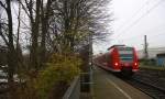 Die Rhein Niers Bahn (RB33) kommt die Kohlscheider-Rampe hoch und fährt durch Kohlscheid aus Duisburg-Hbf-Heinsberg-Rheinland) und fährt in Richtung Richterich,Laurensberg,Aachen-West.