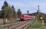 425 112 ist als RB von Homburg/Saar nach Trier unterwegs und fährt in den Hp Besseringen ein.