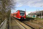 Die Rhein Niers Bahn (RB33) kommt die Kohlscheider-Rampe hoch und fährt durch Kohlscheid aus Duisburg-Hbf-Heinsberg-Rheinland) und fährt in Richtung Richterich,Laurensberg,Aachen-West.