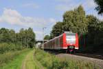 RB 33, Rhein-Niers-Bahn, 425 024 von Heinsberg / Duisburg, auf der KBS 485 bei Geilenkirchen am 26.9.2015 auf den Weg nach Aachen.