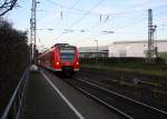 Die Rhein Niers Bahn (RB33) kommt die Kohlscheider-Rampe hoch aus Duisburg-Hbf nach Aachen-Hbf und fährt durch Kohlscheid in Richtung Richterich,Laurensberg,Aachen-West.