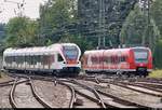 RABe 521 009 (Stadler FLIRT) der Regio-S-Bahn Basel (SBB) als SBB87697  Seehas  von Engen nach Konstanz fährt am abgestellten 426 014-7 von DB Regio Baden-Württemberg vorbei und erreicht damit den Bahnhof Singen(Hohentwiel) auf Gleis 2.
Aufgenommen am Ende des Bahnsteigs 4/5.
[14.7.2018 | 17:02 Uhr]