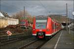 426 519/019 und 426 517/017 verlassen als RE16  Ruhr-Sieg-Express  den Bahnhof von Letmathe.