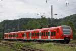 426 542  Herfeld  und ein weiterer 426 verlassen am 23.6.11 den Bahnhof Bullay.