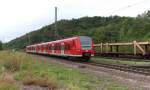 Ein Farbtupfer an einem Regentag -   426 037 + 426 038 als RB auf der KBS 685 beim Bf.