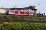 Unser saarländischer Werbe-Mini-Quietsche 426 038 ist auf der Relation Trier - Homburg am 21.10.2013 unterwegs.