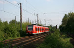 426 015 und ein mir unbekannter 426er erreichen zum Aufnahmezeitpunkt den Bahnhof Oberhausen-Sterkrade.