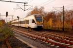 Mit gut 140 KM/h donnert der ET 7.03 der Eurobahn als RE 13 von Venlo nach Hamm/Westfalen durch den Bahnhof Korschenbroich an diesem Samstag den 6.November2010.