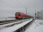 RE 33314 Binz-Stralsund am 08.Dezember 2010 beim Verlassen von Bergen/Rgen.