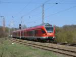 429 026 bei der Einfahrt,am 20.April 2011,mit dem RE Sassnitz-Rostock in Sagard.