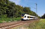 Aus Viersen kommend ist hier der Eurobahntriebwagen ET 7.08 auf dem Weg nach Venlo NL zusehen, gleich kreuzt er den B Stadtgarten in Dlken.