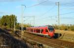 429 026 mit RE9 aus Sassnitz kommend, im letzten Licht am 18.10.12 in Rostock.