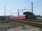 Als RE Rostock-Sassnitz fuhr 429 026,am 20.April 2011,in den Bahnhof Lietzow ein.