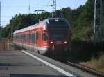 RE 13175 aus Lietzow,am 21.Juli 2013,bei der Einfahrt in Binz,gefahren vom 429 028.