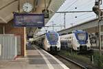 National Express ET 865 und 367 kreuzen hier am 20.8.2021 um 9.40 Uhr im HBF Münster in Westfalen.